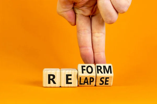 Relapse Reform Symbol Businessman Turns Cubes Changes Word Relapse Reform — Stock Photo, Image