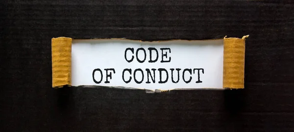 Código Conduta Símbolo Palavras Código Conduta Aparecem Atrás Papel Preto — Fotografia de Stock