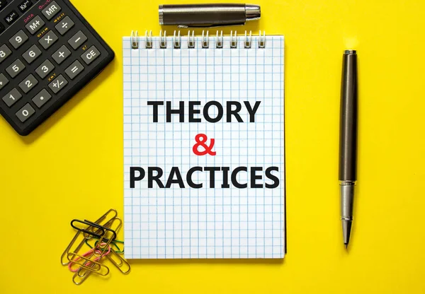 Theory and practice symbol. Words \'Theory and practice\' on white note. Beautiful yellow background, paper clips, metallic pen and calculator. Business, theory and practice concept. Copy space.