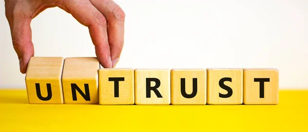 Untrust Trust Symbol Businessman Turns Wooden Cubes Changes Words Untrust — Stock Photo, Image