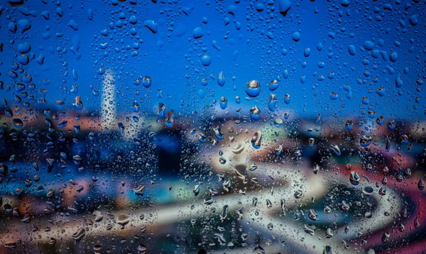 Uitzicht Stad Door Een Raam Een Regenachtige Nacht Regen Druppels — Stockfoto