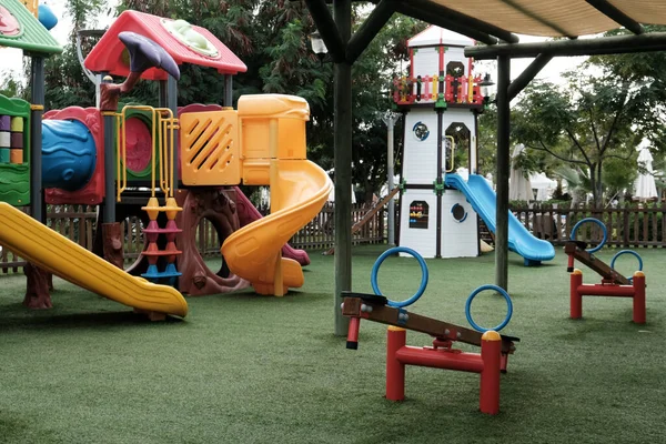 Empty Swings Kindergarten Playground Closed Children Pandemic Unattended Slide Swing — Stock Photo, Image