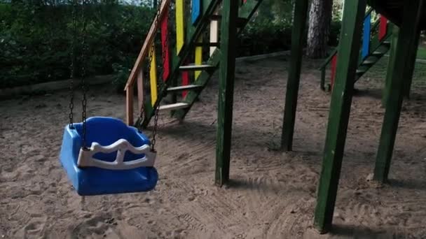 Empty Swing Moving Back Forth Deserted Playground Coronavirus Outbreak Children — Vídeo de stock