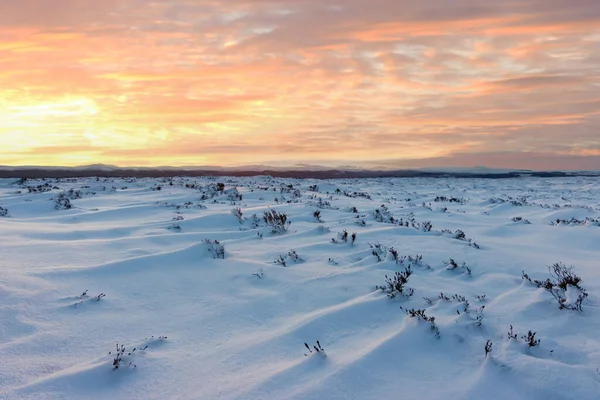 Snow drifting abstract background sunset