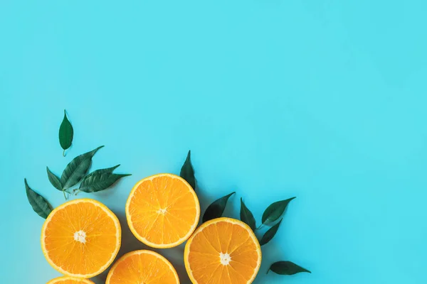 Creative Flat Lay Tasty Half Cut Oranges Green Leaves Vibrant Royalty Free Stock Images