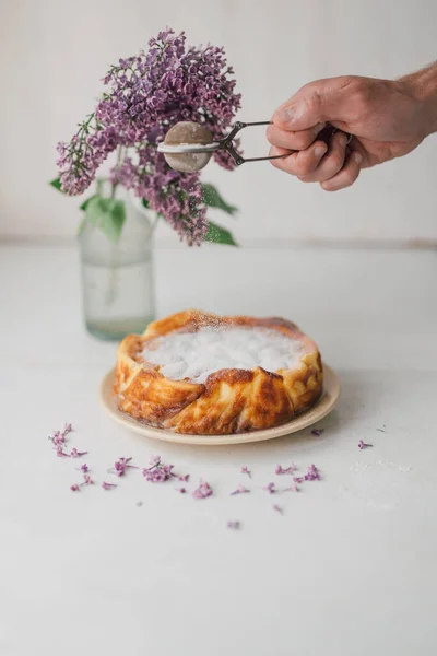 Sprinkling Icing Sugar Freshly Baked Ricotta Cheesecake White Table Lilac Royalty Free Stock Images