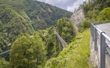 Driving on the spectacular Via Cantonale from Domodossola to Locarno clipart