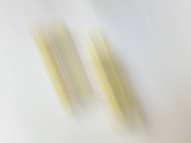 Beyaz Arkaplanda Kahverengi ve Sarı Renk Yüzey Hareketi Bulanıklığının Kapanışı