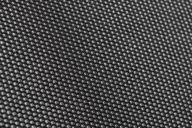 Güzel kumaşın kabataslak yüzeyinin soyut desen dokusu ve arkaplanının yakınlaştırılması