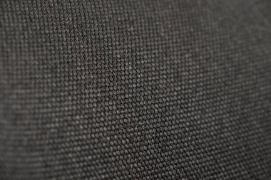 Güzel kumaşın kabataslak yüzeyinin soyut desen dokusu ve arkaplanının yakınlaştırılması