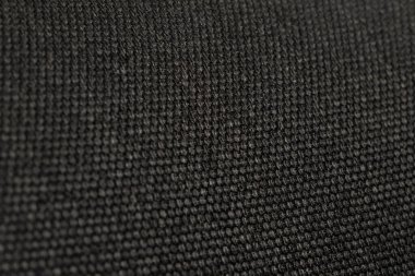 Güzel kumaşın kabataslak yüzeyinin soyut desen dokusu ve arkaplanının yakınlaştırılması