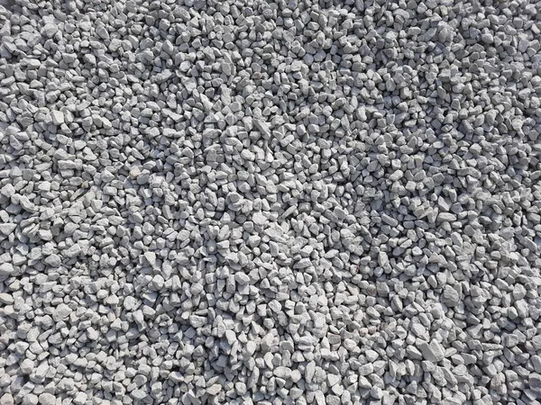 Een Close Van Bouwmateriaal Kleine Stenen Textuur Achtergrond — Stockfoto