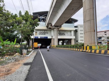 Bangalore, Karnataka, India-Jun 09 2021: Closeup of empty roads due to covid 19 lockdown rules restriction, for transport in a Bangalore, Yelachenahalli Metro Station Road looks beautiful and clean