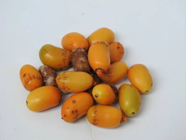 Closeup Golden Yellow Color Young Raw Zehidi Dates Seeds Isolated — 스톡 사진