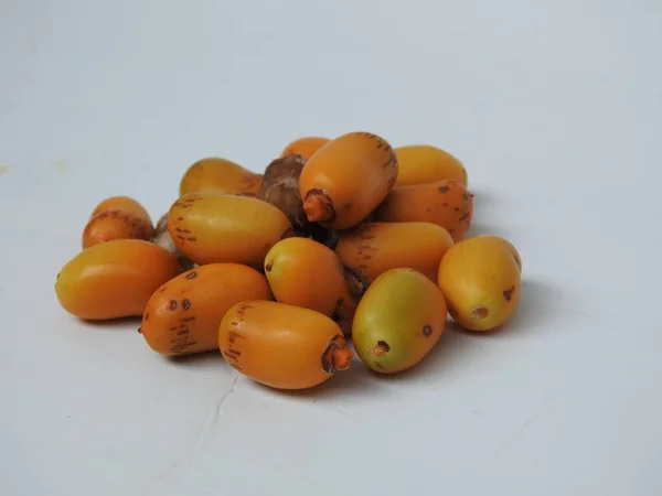 Closeup Golden Yellow Color Young Raw Zehidi Dates Seeds Isolated — Stok fotoğraf