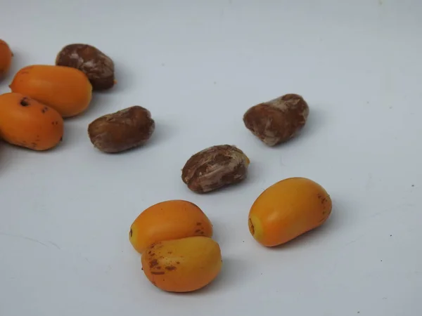 Closeup Golden Yellow Color Young Raw Zehidi Dates Seeds Isolated — Foto de Stock