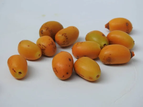 Closeup Golden Yellow Color Young Raw Zehidi Dates Seeds Isolated — Foto de Stock