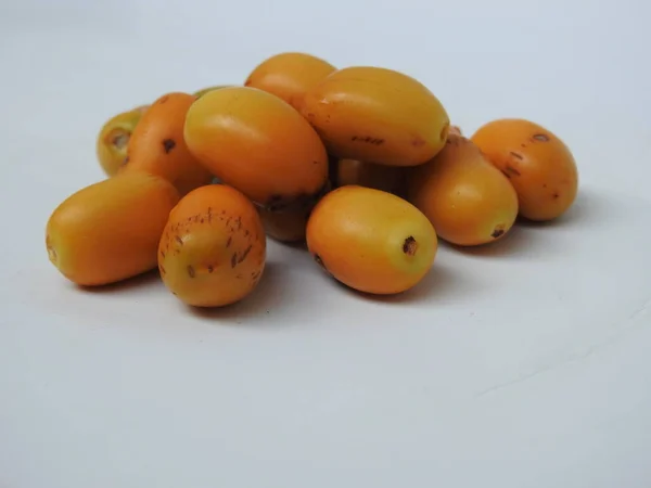 Closeup Golden Yellow Color Young Raw Zehidi Dates Seeds Isolated — Foto de Stock