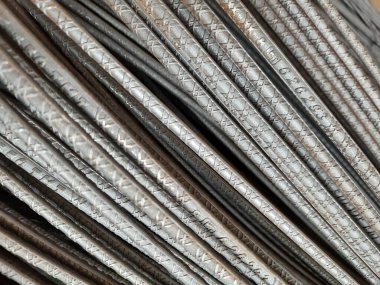 Closeup of building construction material mild steel tmt bars in the size of 16, 8, 10 and 12mm texture and background