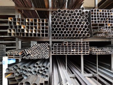 Closeup of different design and shapes of Mild Steel Railing materials in the shop of sale using in the building construction.