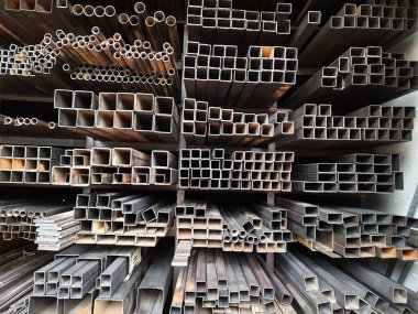 Closeup of different design and shapes of Mild Steel Railing materials in the shop of sale using in the building construction.