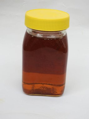 Bangalore, Karnataka, Hindistan-21 Mayıs 2021: Dünyalar arası 1 Numaralı Bal Markasının Kapanışı - 250 gm Dabur Bal şişesi beyaz arka planda izole edildi