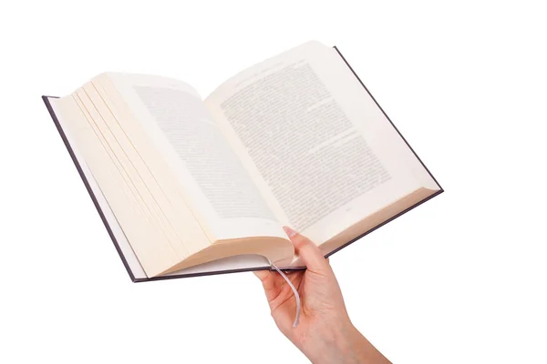 Female hand holding a book isolated on white background — Stock Photo, Image