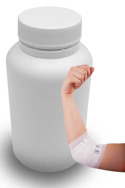 Isolated hand of woman, injured painful elbow with white bandage and medicine bottle — Stock Photo, Image