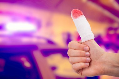 Hand thumb with blood and bandage isolated on abstract background clipart