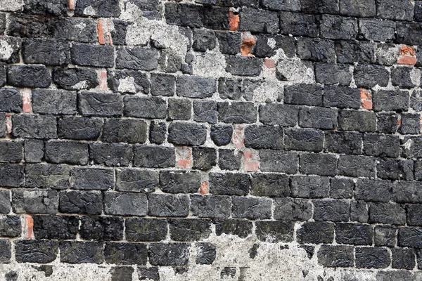 Wall with textured stone blocks — Stock Photo, Image