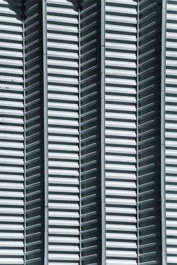 Koyu gri doku, arka plan ile bir metal yüzeye dokunarak