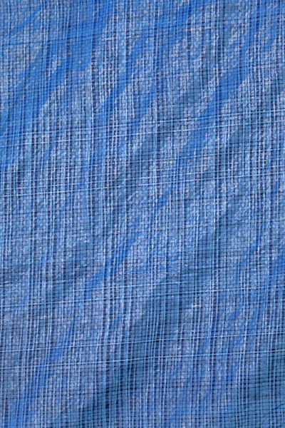 Blue fabric with lines as a background or texture — Stock Photo, Image