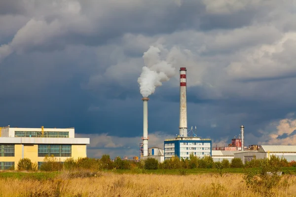 Industrial power plant with smokestack — Stock Photo, Image