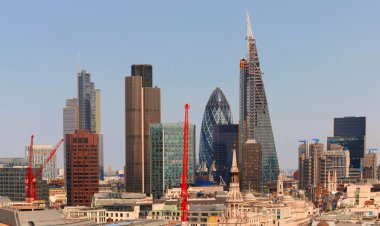 City of London one of the leading centres of global finance.This view includes Tower  Gherkin,Willis Building, Stock Exchange Tower and Lloyds of London and Canary Wharf at the background. clipart