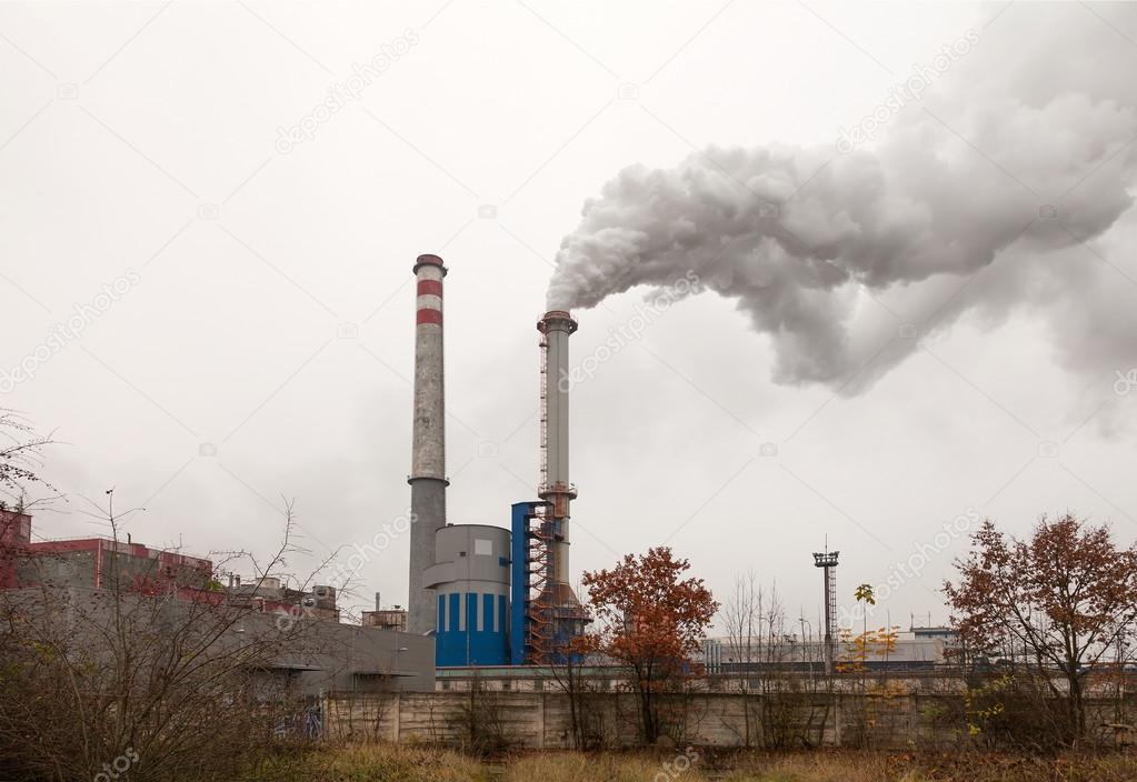 Factory, two smoking chimneys