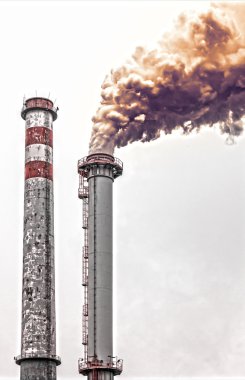 Two smoking chimneys, hdr clipart