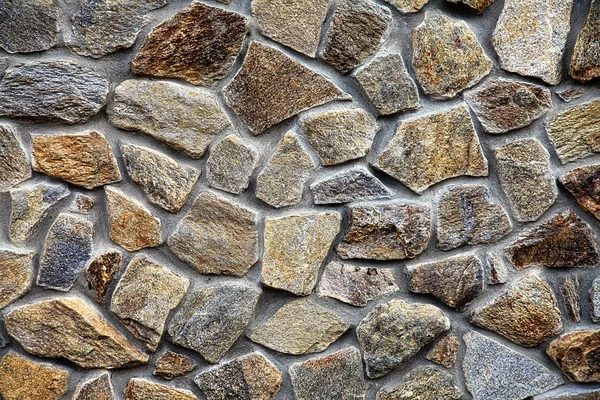Wall with textured stone blocks — Stock Photo, Image