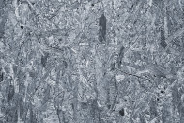 Arka plan olarak gri ahşap Sunta