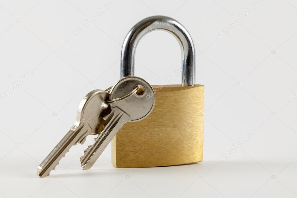 Padlock with keys on a white background