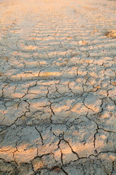 Textura de fondo de tierra seco y agrietado — Foto de Stock