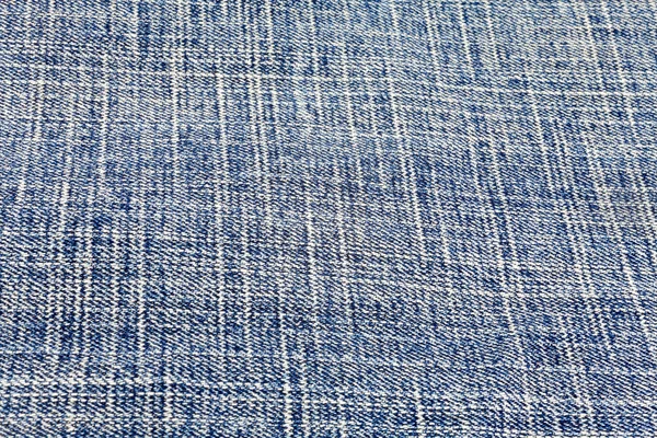Detalhe de close-up de fundo de tecido de jeans azul — Fotografia de Stock