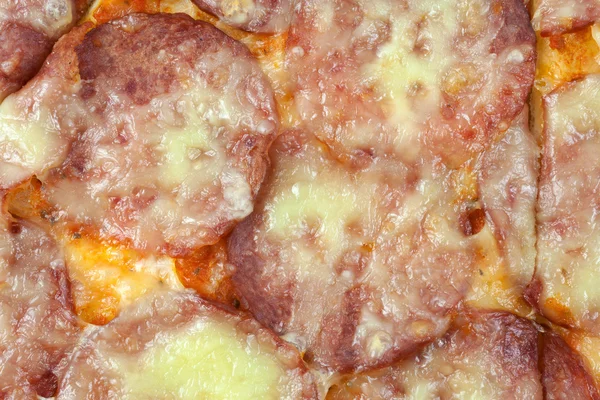 Salami pizza background — Stock Photo, Image