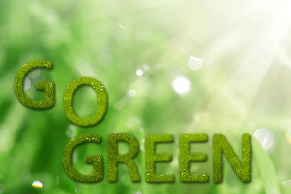 Go green sign on natural background — Stock Photo, Image