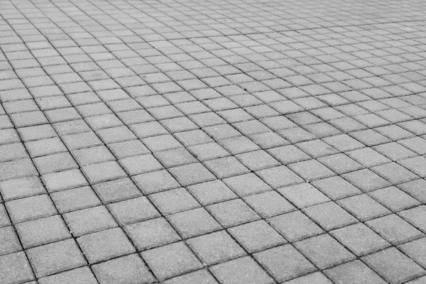 Grey brick stone street road. Light sidewalk, pavement texture — Stock Photo, Image