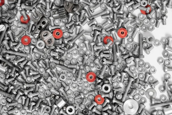 Nuts and bolts as industrial background — Stock Photo, Image