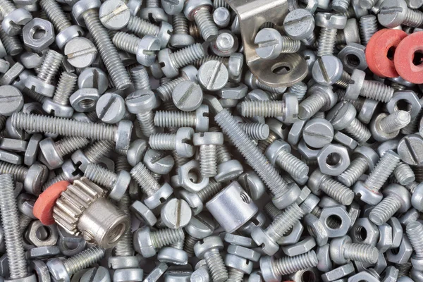 Nuts and bolts as industrial background — Stock Photo, Image