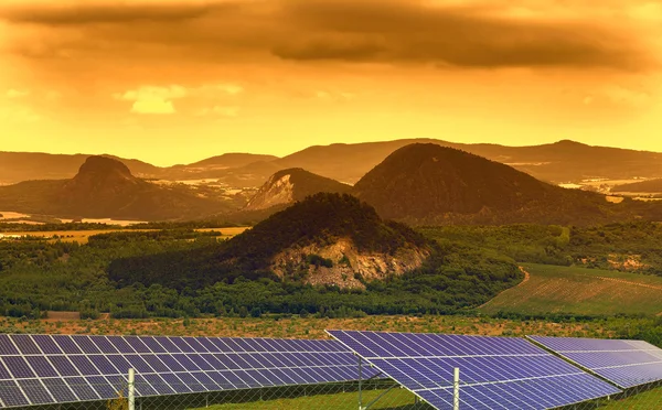Landscape with solar panels in the sunset — Stock Photo, Image