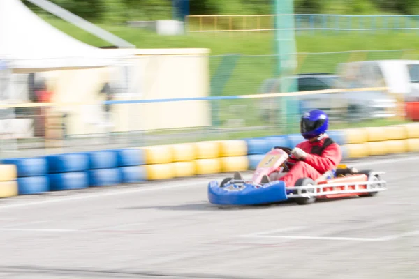 Závodní motokáry rozostření — Stock fotografie