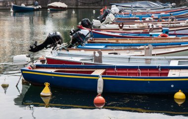 boats moored in the dock of Lake Garda