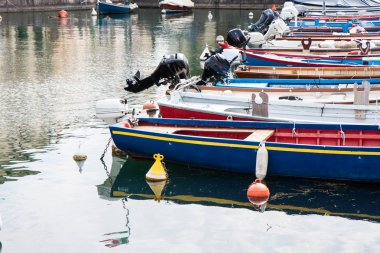 boats moored in the dock of Lake Garda